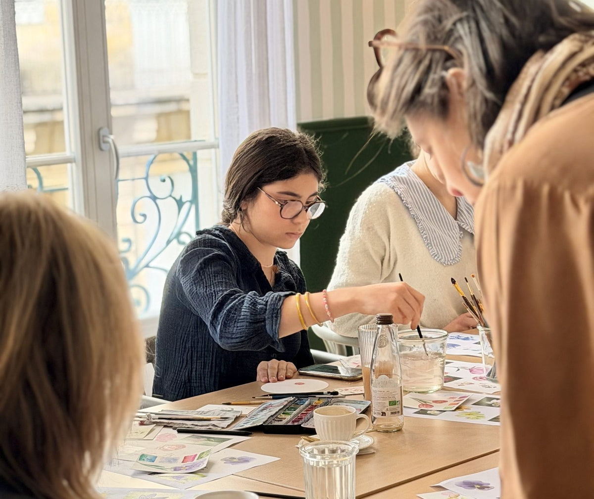 Participantes concentrées pendant un atelier